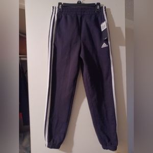 Boys Adidas pants. Brand new with tags size 7/8. Definitely 8!